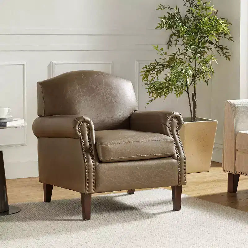 Fauteuil en cuir végane transitoire avec clous décoratifs